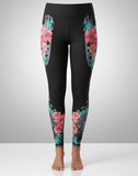 Women's hibiscus tights with island-inspired print, front phone pockets, and back zipper pocket made from nylon/spandex and polyester.