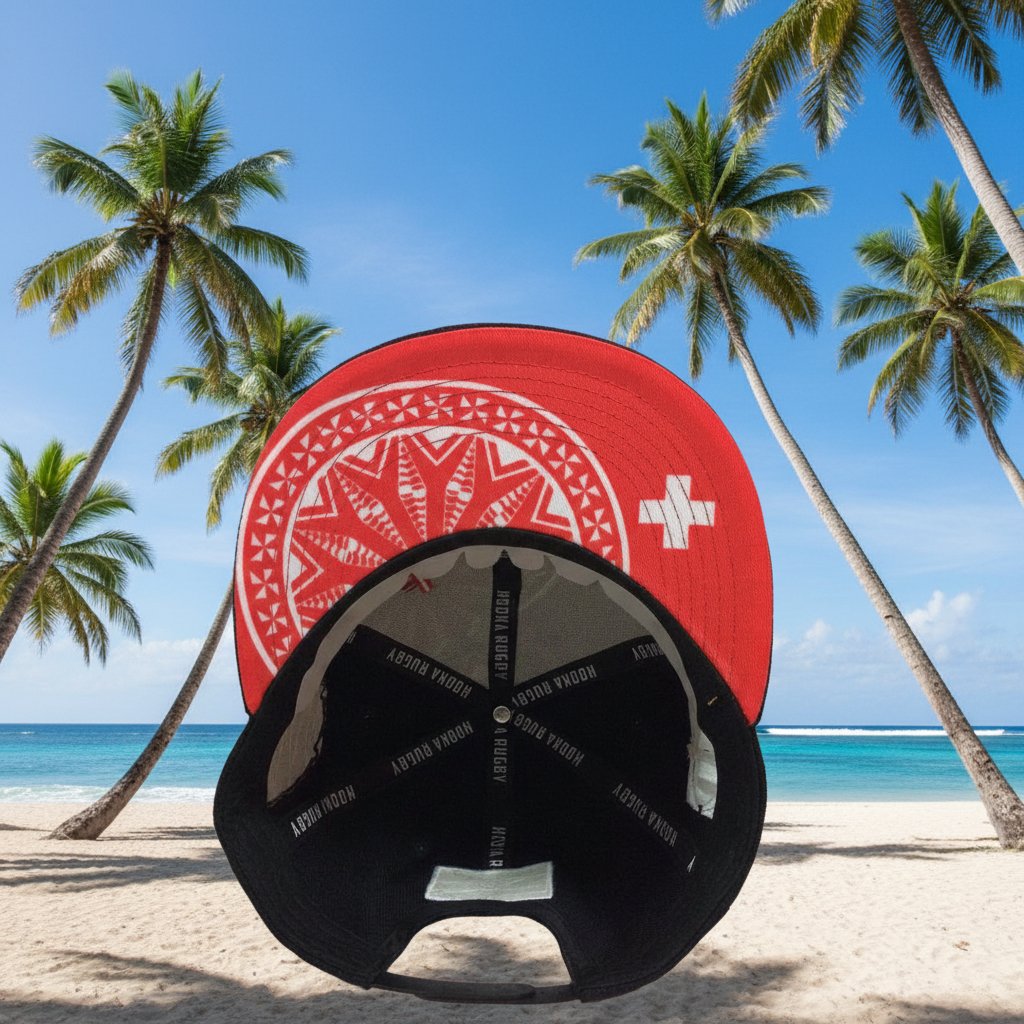 Tonga Hat Ngatu design with 3D embroidery and red sublimated front panel shown from the inside and underside of the bill with Tappa pattern.
